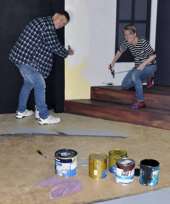 Finishing touches: Trevor Kohlhagen and Nicky Bath painting the 'Talking Heads' set. The series of four one-act plays opens on July 20.