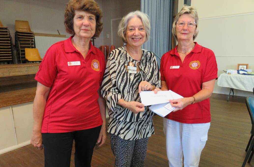 Good cause: Bodalla Embroiderers president Marilyn Gibson (centre) presents the cheque to Moruya Hospital Auxiliary's Lyn Rixon & Kath Smith. 