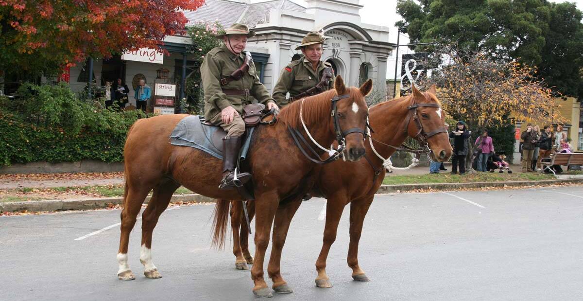 Neale Lavis led out the Anzac Day march in Braidwood in 2014, representing the Light Horse, with Andrew Mortimer. Photo, Alex Rea