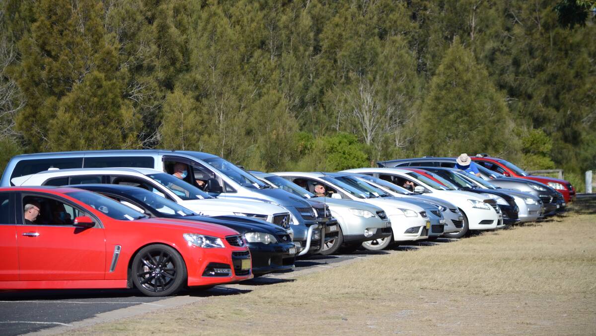 Patients wait in their cars at the Hanging Rock car park, before they are called for testing.