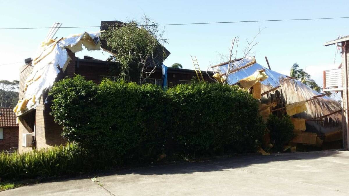 Part of a holiday home roof was blown off completely by wind and damaged an adjacent house at Lilli Pilli on November 26.