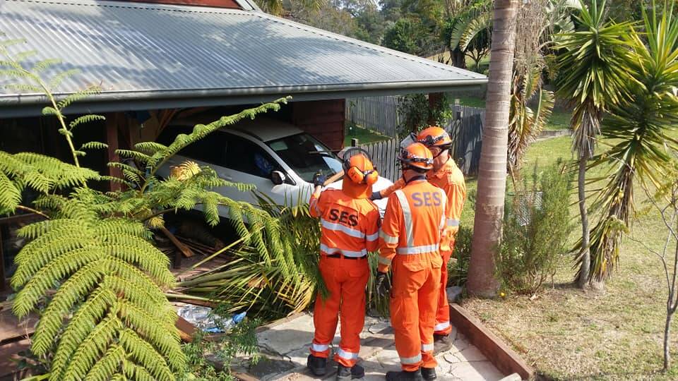 A car left in reverse rolled across the road into the bedroom wall of a neighbour's house, SES says. Picture: Moruya SES