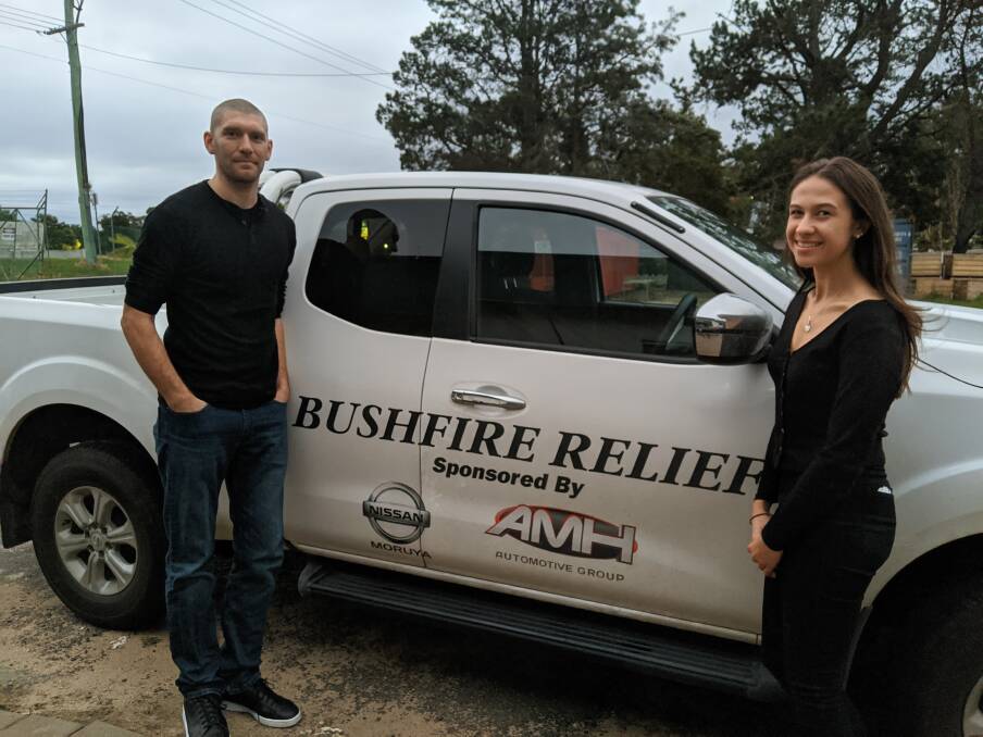 Mathew Hatcher and Aymee Wise, part of the South Coast Donations Logistics team.