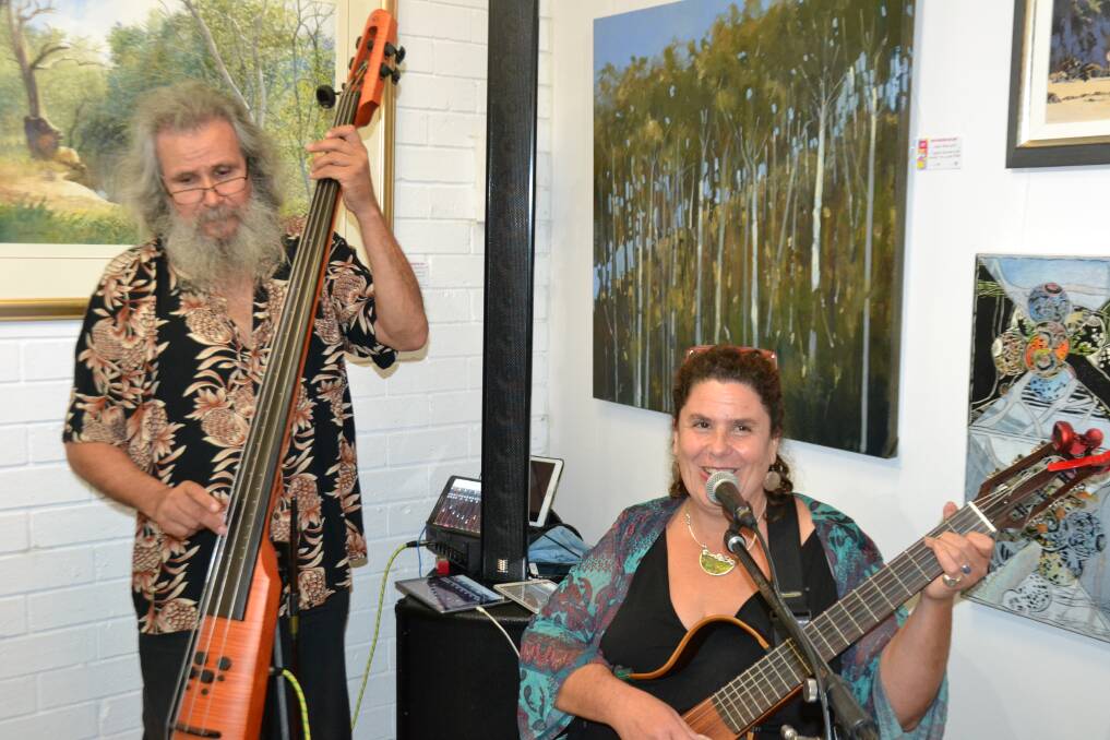 Milena Cifali and Jim Horvath performing as "The Awesome" at the 2019 River of Art Festival art prize exhibition on Thursday, May 16.