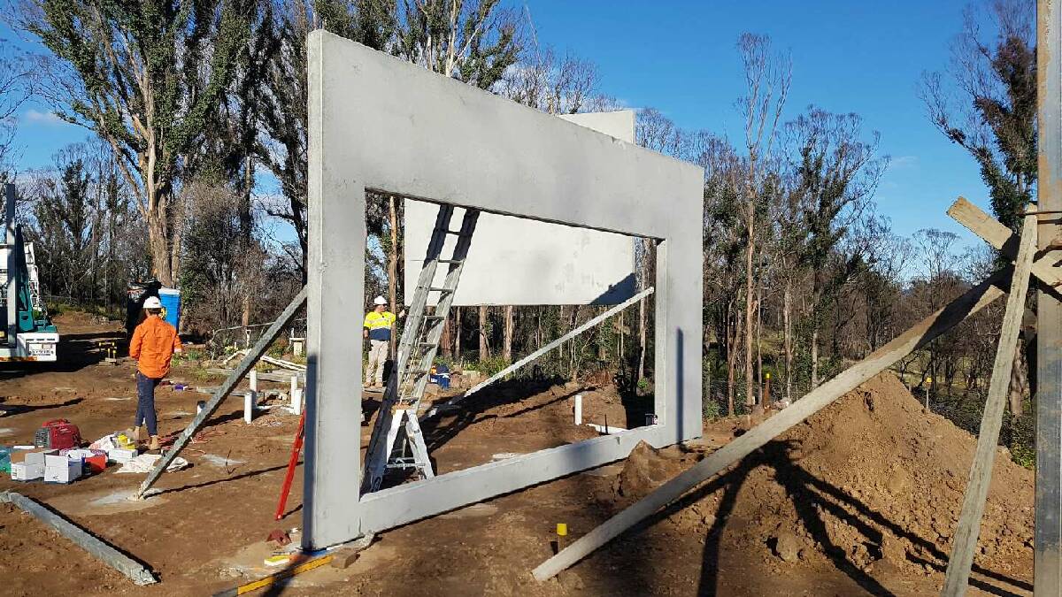 Mick Johnson says builders on the South Coast, including at this Quaama site, can build a house at a much faster rate than traditional methods, by using precast concrete panels.