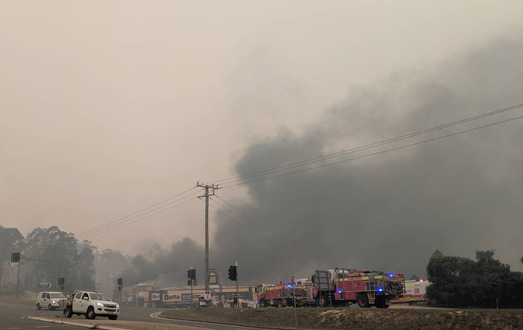 Fire burns structures at the Batemans Bay industrial site on New Year's Eve. What have you seen and what have you been through?