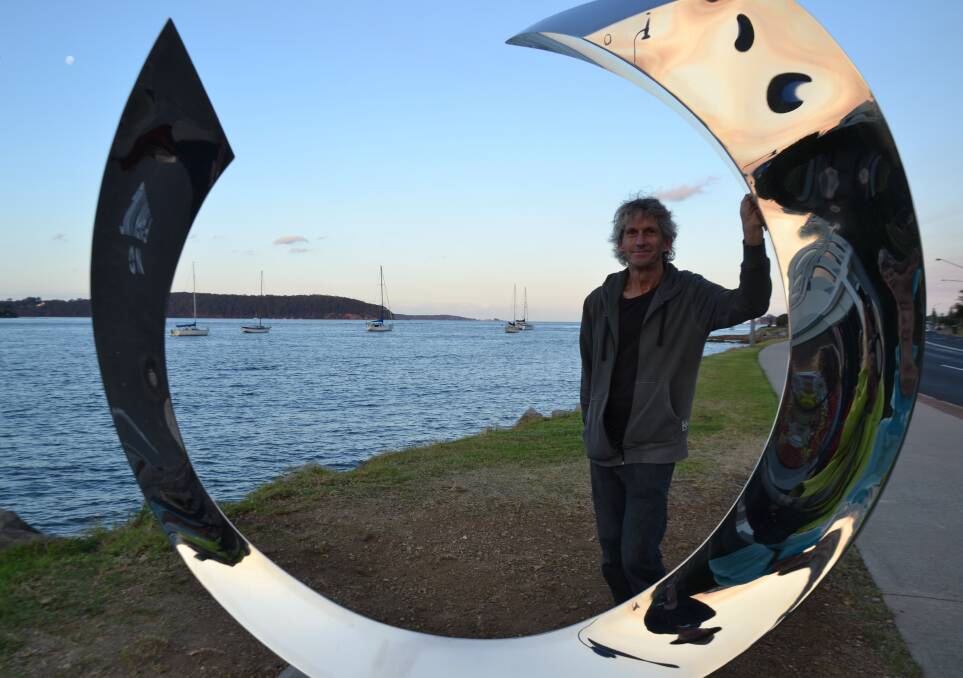 John Fitzmaurice stands by his sculpture "Portal" at the Mara Mia Walkway, Batemans Bay.