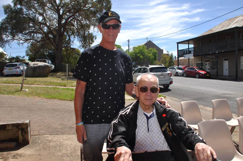 95-year-old WWII veteran and Moruya RSL patron Harold Barkley (seated) with son Paul Barkley, of Moruya, at the Remembrance Day service.