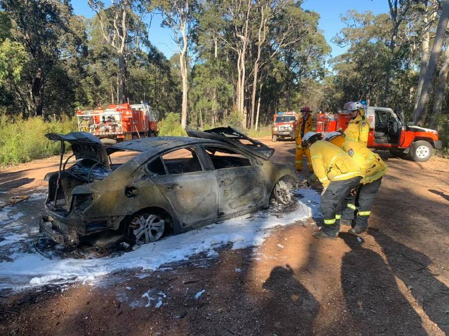 RFS crews extinguish 'suspicious' car fire at Dog Trap Road, near Ridge Road, south of Batemans Bay. Picture: Batemans Bay RFS.