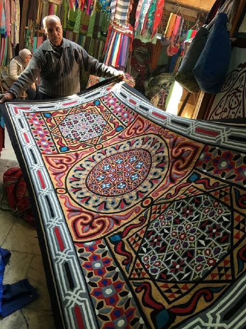 HISTORY: Tentmaker Ahmed Naguib displays one of the traditional pieces.