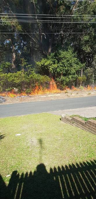 Back burning on South Street, Ulladulla. Photo: Sam Driver. 