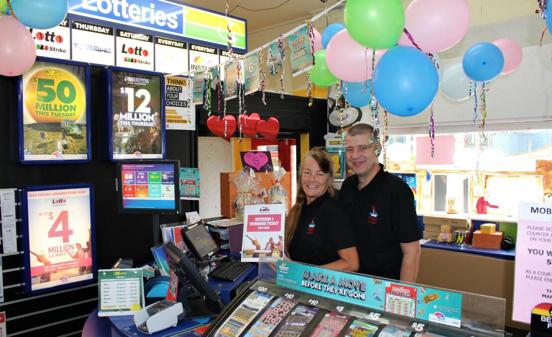 CASHED UP: Ulladulla Lotteries and Souvenirs staff Helga Danielson and Rob Doyle are celebrating after an Ulladulla grandfather purchased his winning 24-game entry at the shop. The man now has a cool $1.2 million in his bank account. 