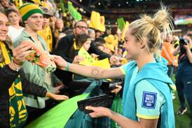 Ellie Carpenter gives a boot to a fan after the Matildas' inspiring run at this year's World Cup. Picture Getty Images