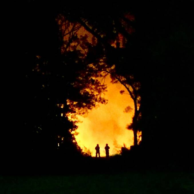 Fire fighters battle the Kings Point blaze. Photo: Tim Wimbourne.