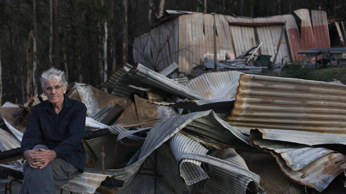 Rodney Hayes at the remains of his Termeil home. Image: Greenpeace.