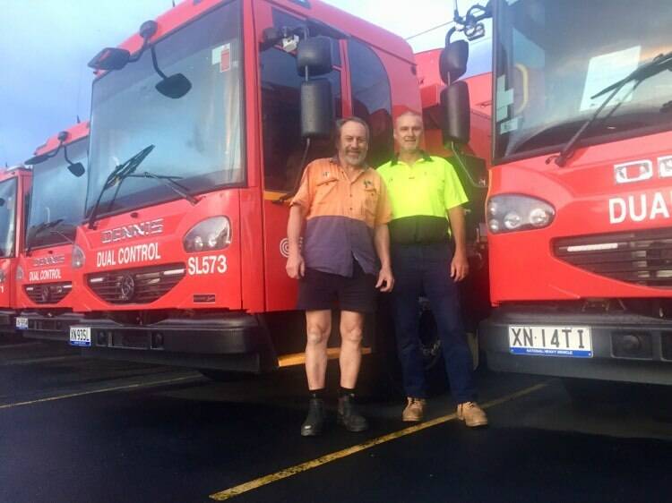 NO RUBBISH HERE: Charlie Schusser and Wayne Jones at the Nowra depot.