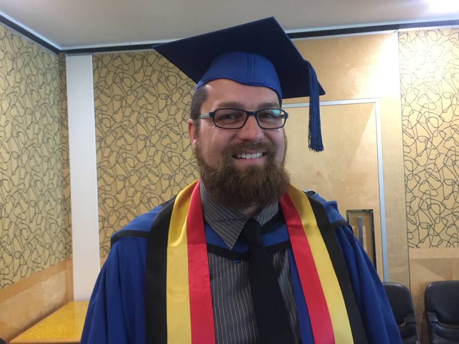 Adam Gowen received first-class honours at the University of Wollongong's graduation ceremony in Batemans Bay on Friday.