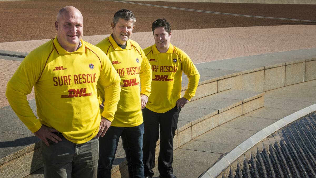 Michael Weyman, Shaun Pike and Andrew Edmunds, who received the Surf Lifesaving Australia national rescue of the month award for March at Parliament House on Thursday. Photo: Elesa Kurtz.