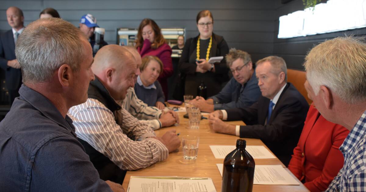 Phil Ryan and other South Coast dairy farmers speak to Bill Shorten and Fiona Phillips in Nowra on Wednesday, May 8.