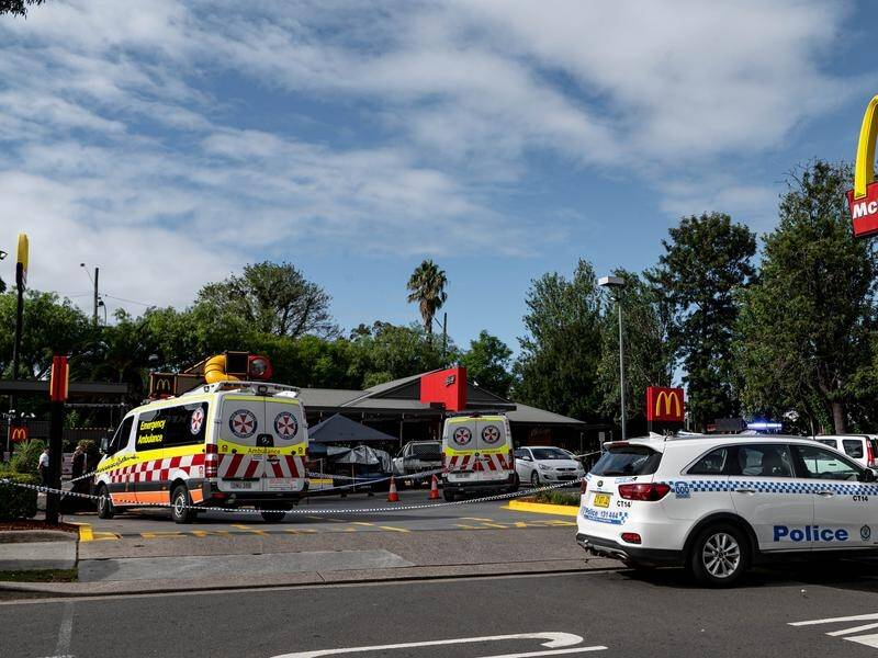 An on-duty ambulance officer was fatally stabbed outside a Sydney fast food restaurant. (Flavio Brancaleone/AAP PHOTOS)