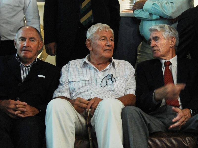 Wallaby great John Thornett (centre) has died aged 83.
