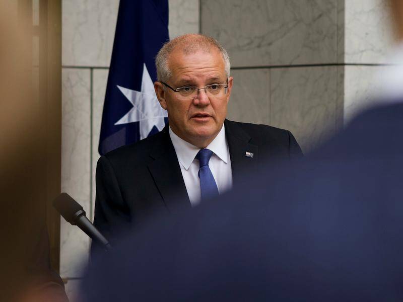 Scott Morrison has choked back tears while officially launching the disability royal commission.