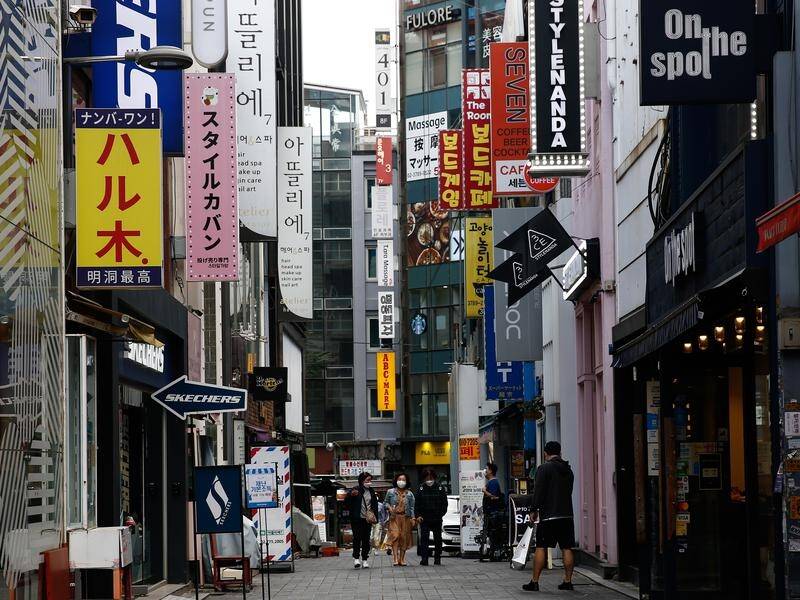Australians in South Korea are barred from restaurants and cafes under strict COVID rules.