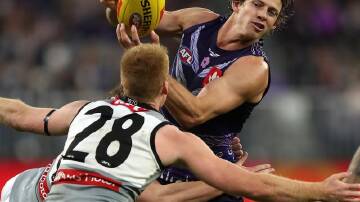 Dockers' Nat Fyfe back after injury and on the ball in their AFL win over Port Adelaide in Perth.