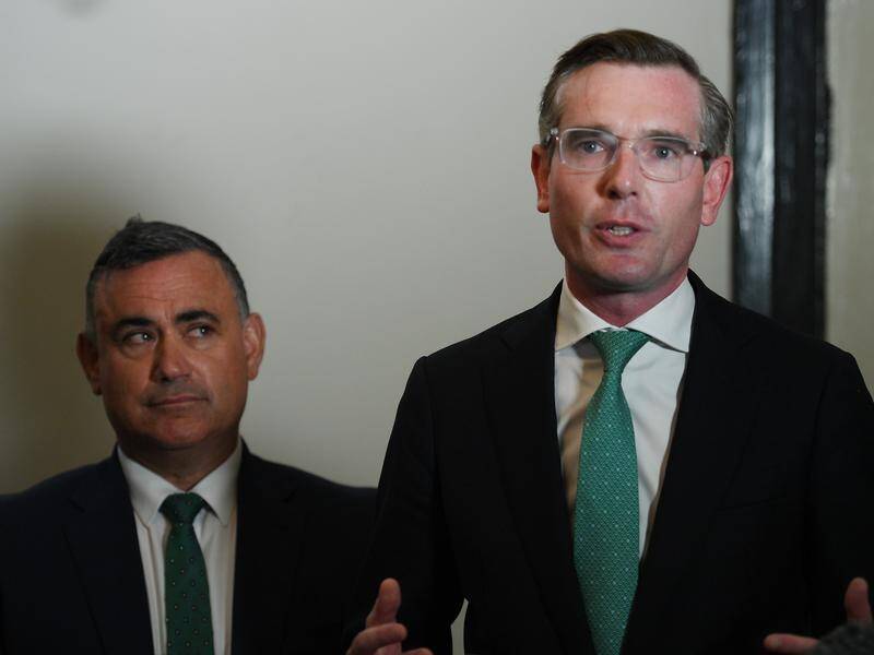 NSW Treasurer Dominic Perrottet (R) will hand down the state's 2021/22 budget on June 22.