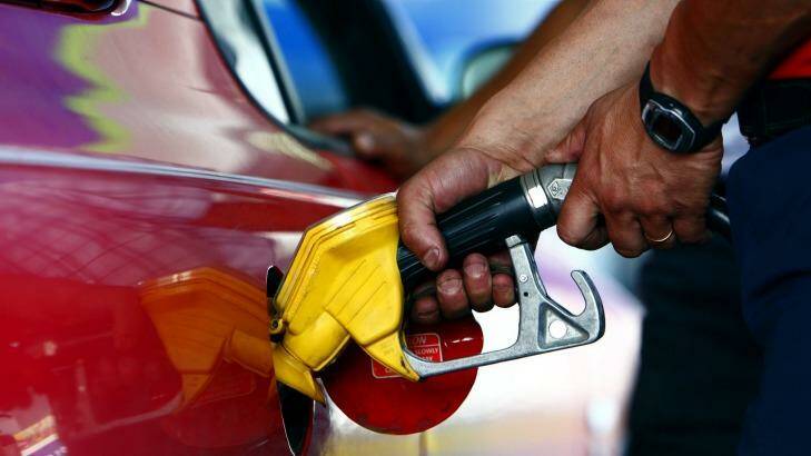 Motorists are being urged to fill up their vehicles before a price spike. Photo: Glenn Hunt