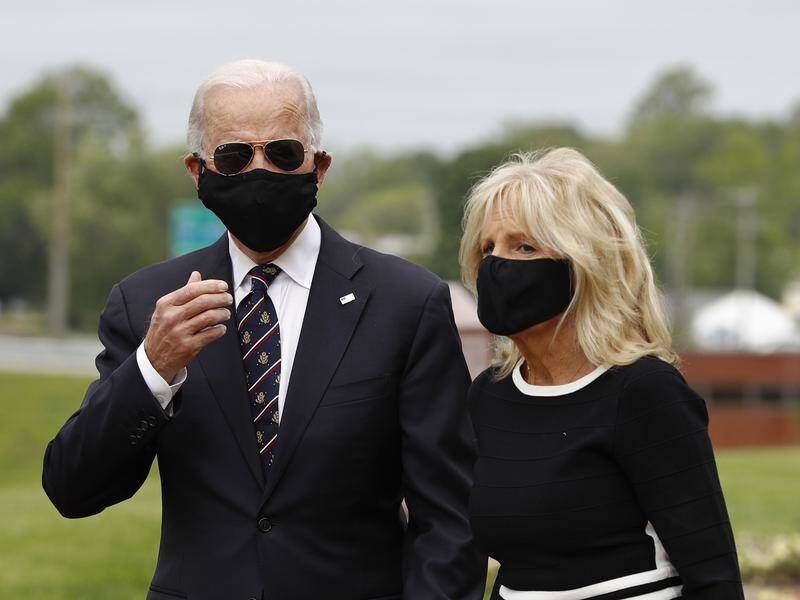 Presidential candidate Joe Biden says Donald Trump is 'stoking deaths' by refusing to wear a mask.