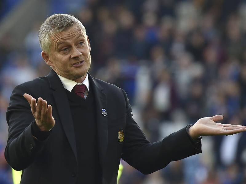 Ole Gunnar Solskjaer gestures to fans at the end of his final match as Manchester United manager.