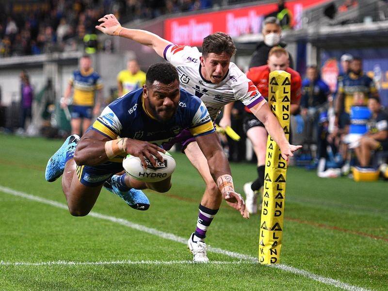 Parramatta's Maika Sivo flies over for a try in Thursday's 14-nil NRL win over the Melbourne Storm.