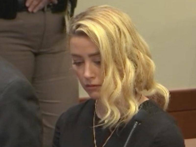 Aquaman actor Amber Heard said the jury's verdict against her was "a disappointment".