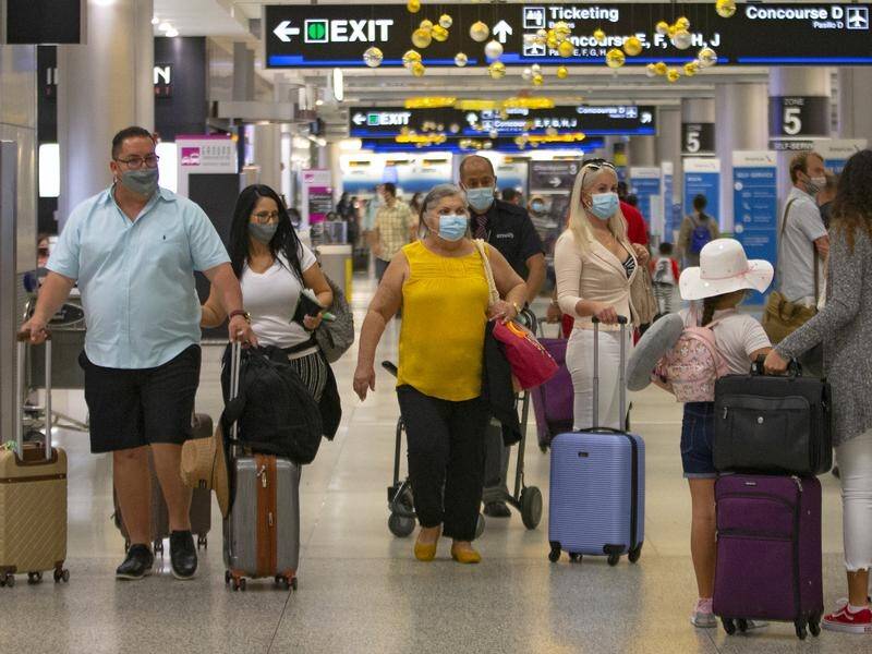 Millions of Americans are preparing to travel for Thanksgiving despite warnings to stay home.