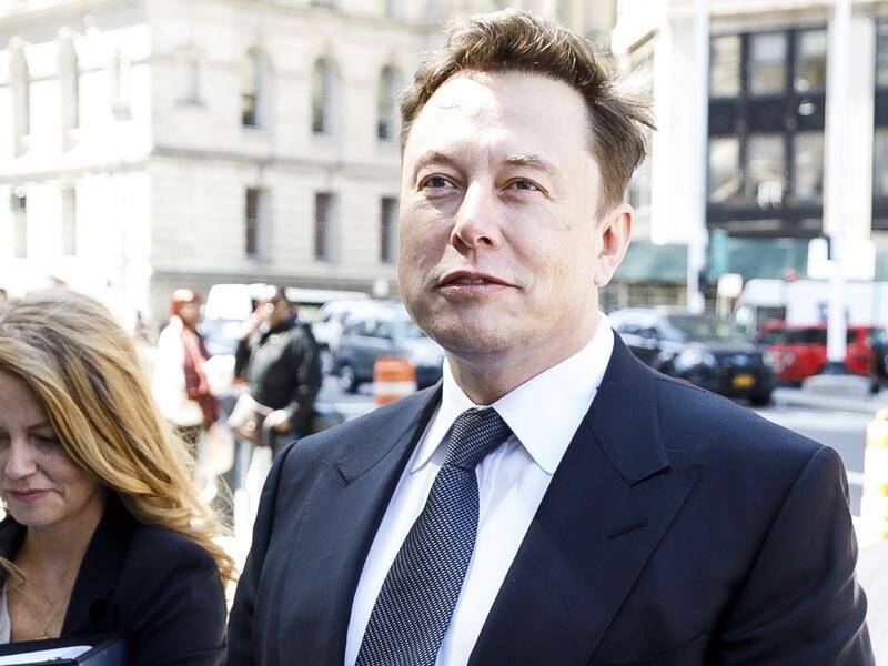 The SEC sued Elon Musk (R) last year over a misleading tweet about Tesla's funding plans.