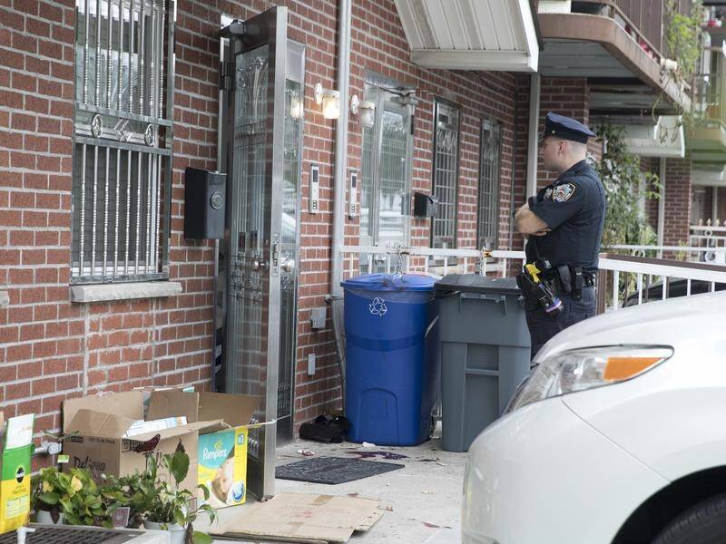 Police called to a New York home have found three infants and two adults with stab wounds.