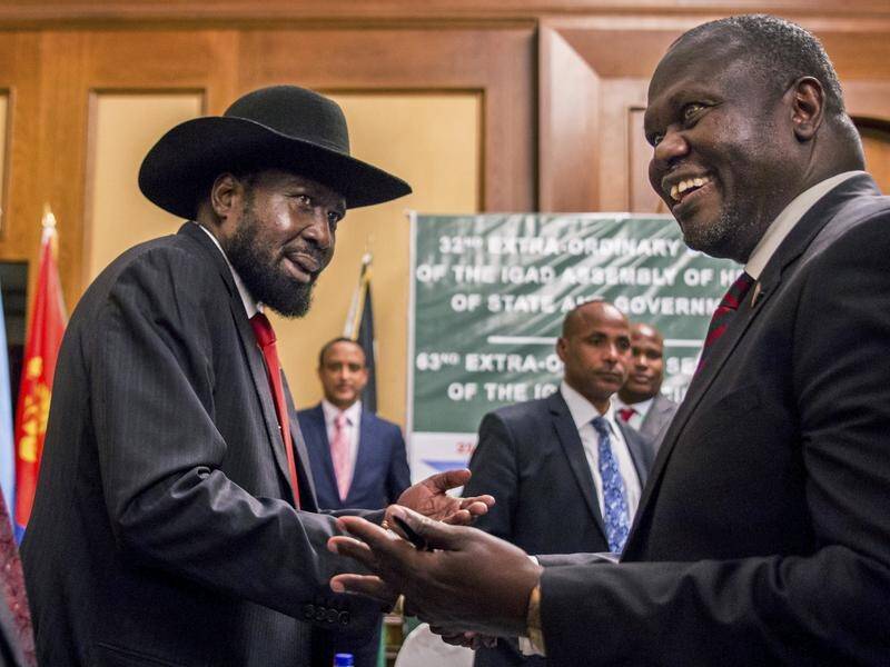 Salva Kiir (L) and Riek Machar have signed a deal to share power, ending South Sudan's civil war.