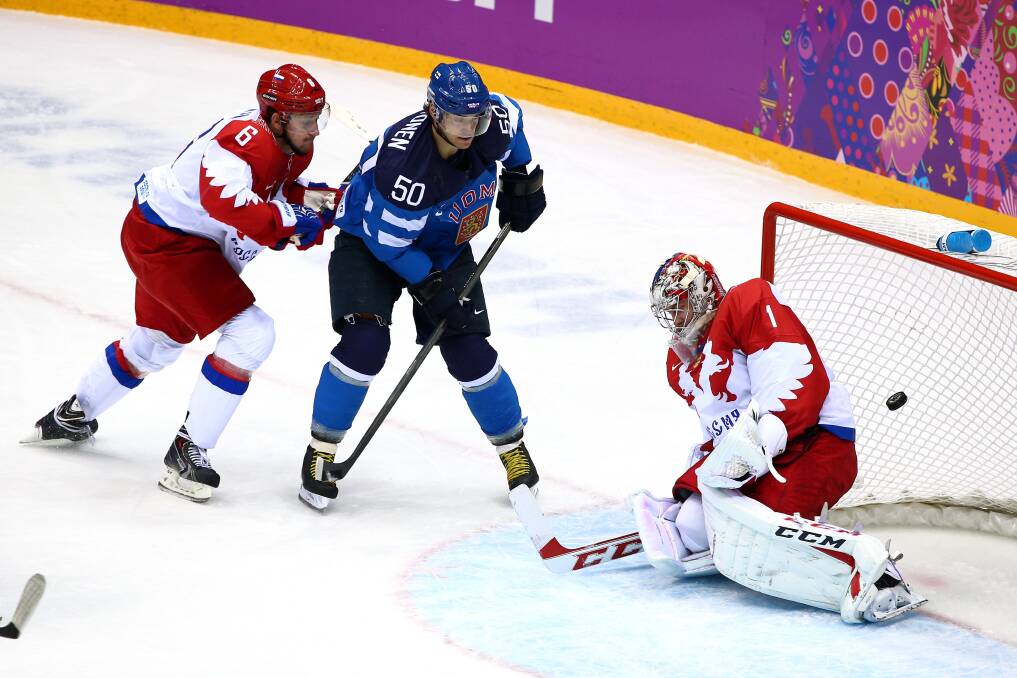 Зимних олимпийских игр хоккей с шайбой. ОИ 2014 хоккей Россия Финляндия. Олимпийские игры 2014 хоккей. Хоккей Сочи 2014.