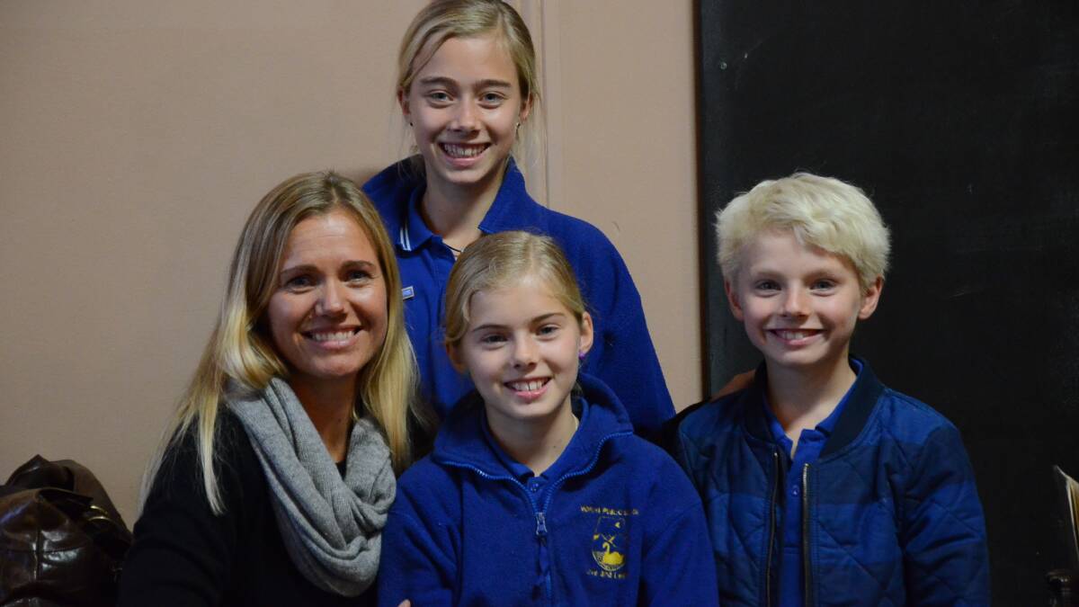 DO IT FOR DARCY: Hydrocephalus sufferer Darcy Coppin (back) with mum Jane, brother Jesse and sister Ruby. 