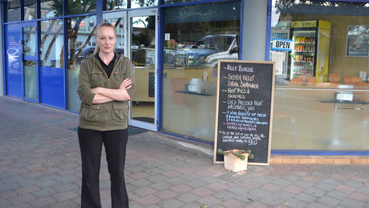 NO MORE: Bay Blue Café owner Amanda Fairhurst has had to remove all outdoor dining because she could not afford a footpath trading license at the moment.