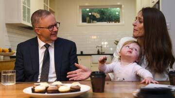 Opposition Leader Anthony Albanese speaks to a member of advocacy group The Parenthood in Sydney last Wednesday. Picture: AAP