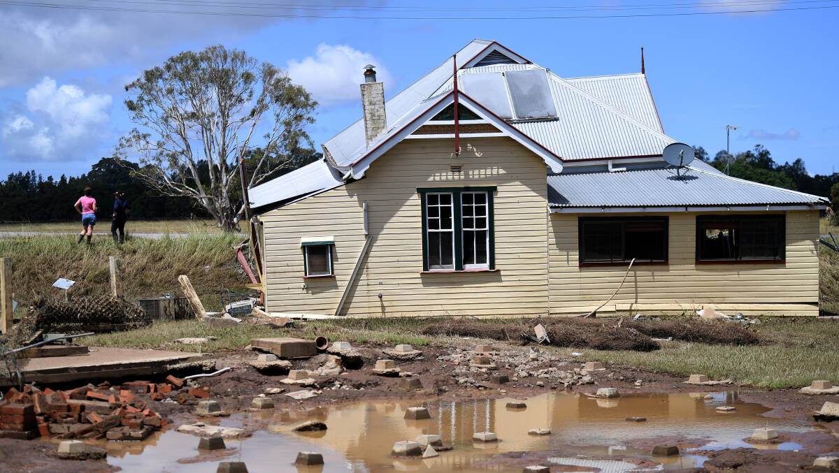 Alison Bruggy's house was pushed off its foundation by flooding at Wyrallah near Lismore last week. Picture: Getty Images