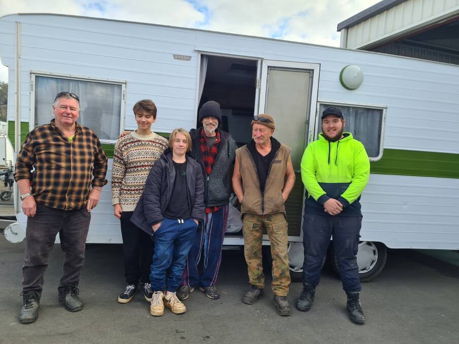 The Whiteside family and the team at Coastal Caravans with the new van. 