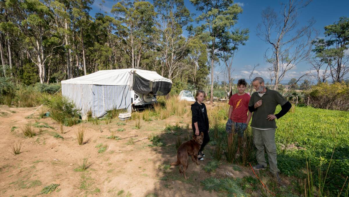 Edward and his sons Jasper and Shamus at their property with the old campsite. 