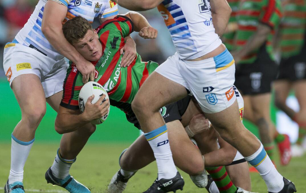 Rhys Kennedy is tackled during his NRL debut for the South Sydney Rabbitohs against the Gold Coast Titans on Sunday, March 31. Photo: Craig Golding.