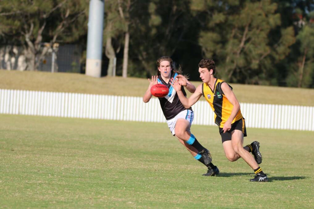 ONE-ON-ONE: Skipper Liam Backo fights for the ball. Photo: Kylie Filmer.