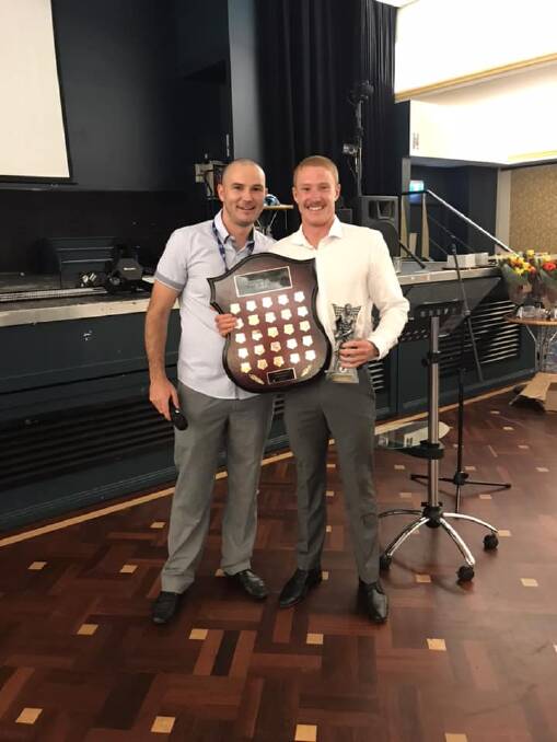 CLUB'S BEST: Ben McKay (right) receives the first-grade best-and-fairest award from coach Michael Kenny.