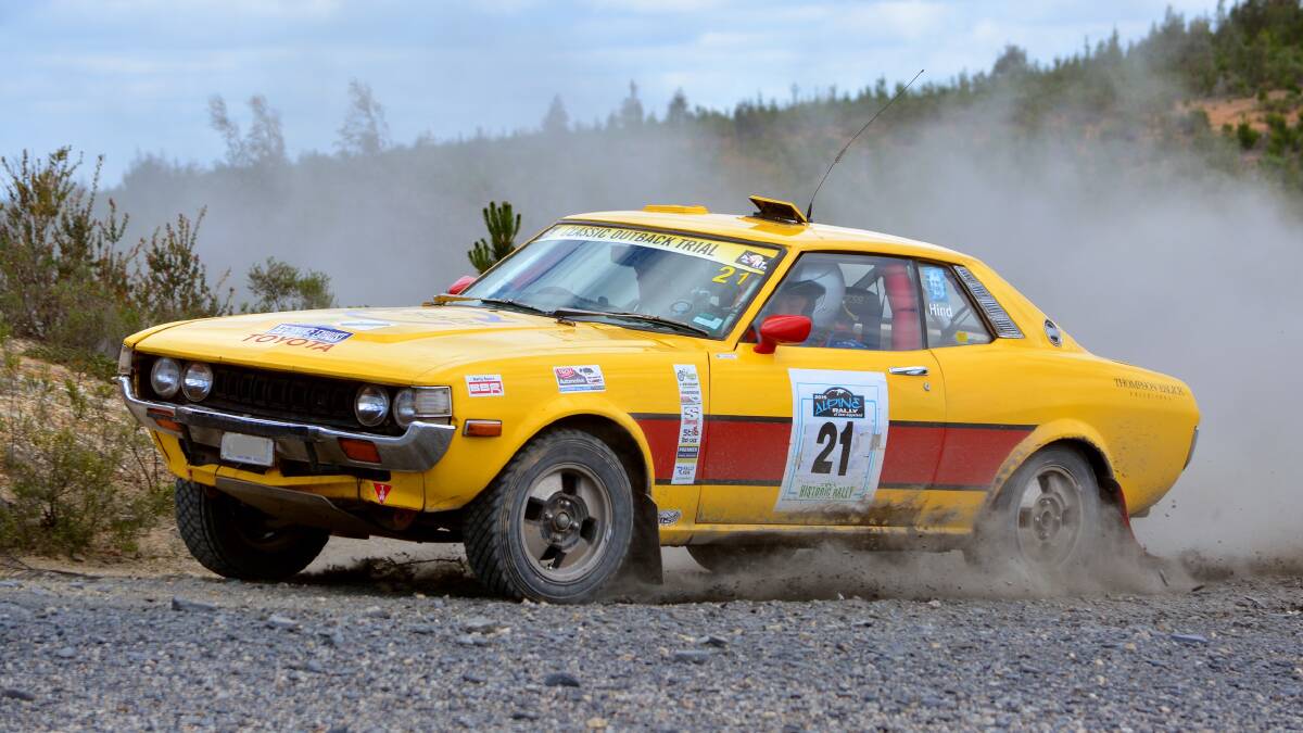 BURNING RUBBER: Peter Thompson and Ken Hind driving their 1976 RA 23 Celica during a rally last year. Photo: David King.