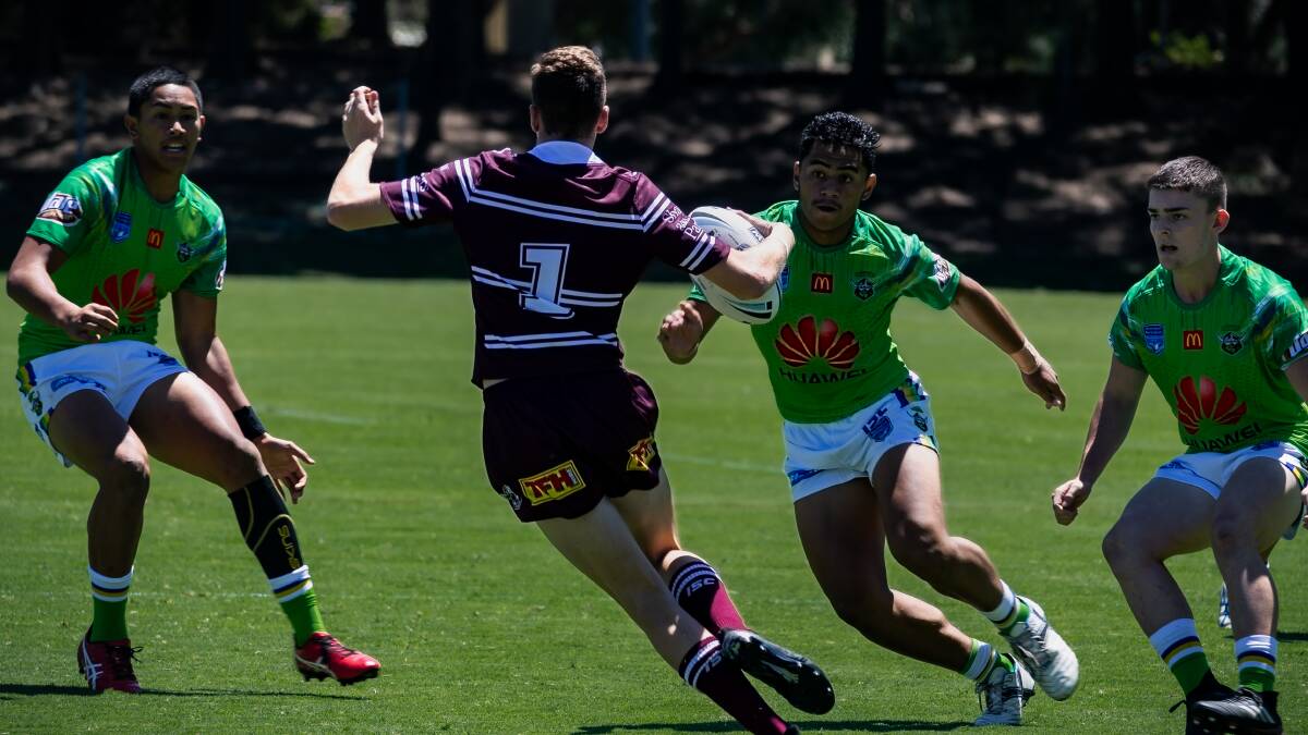 Jahream Lole-Ngarima (left) and Matthew Stewart (right) in defence against Manly-Warringah. Photo: Canberra Raiders.